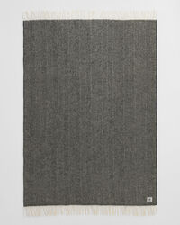 Manta decorativa em lã com padrão espinha de peixe