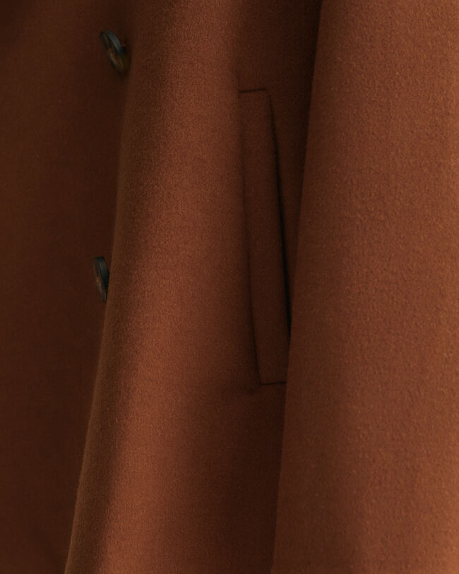 Casaco de marinheiro cosido &agrave; m&atilde;o