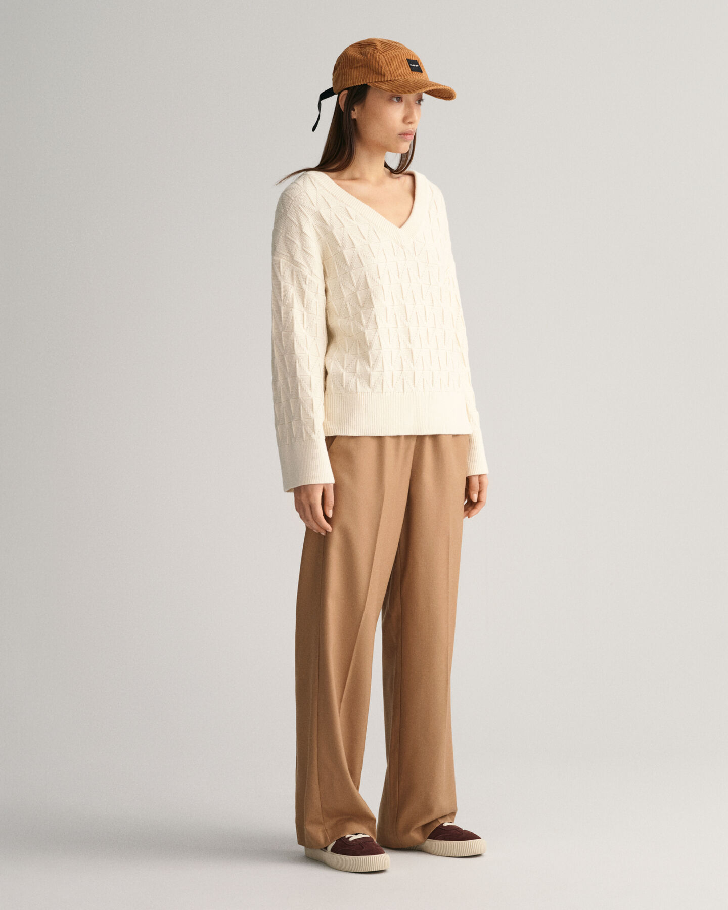 Sweatshirt com decote em V com padr&atilde;o espinha de peixe