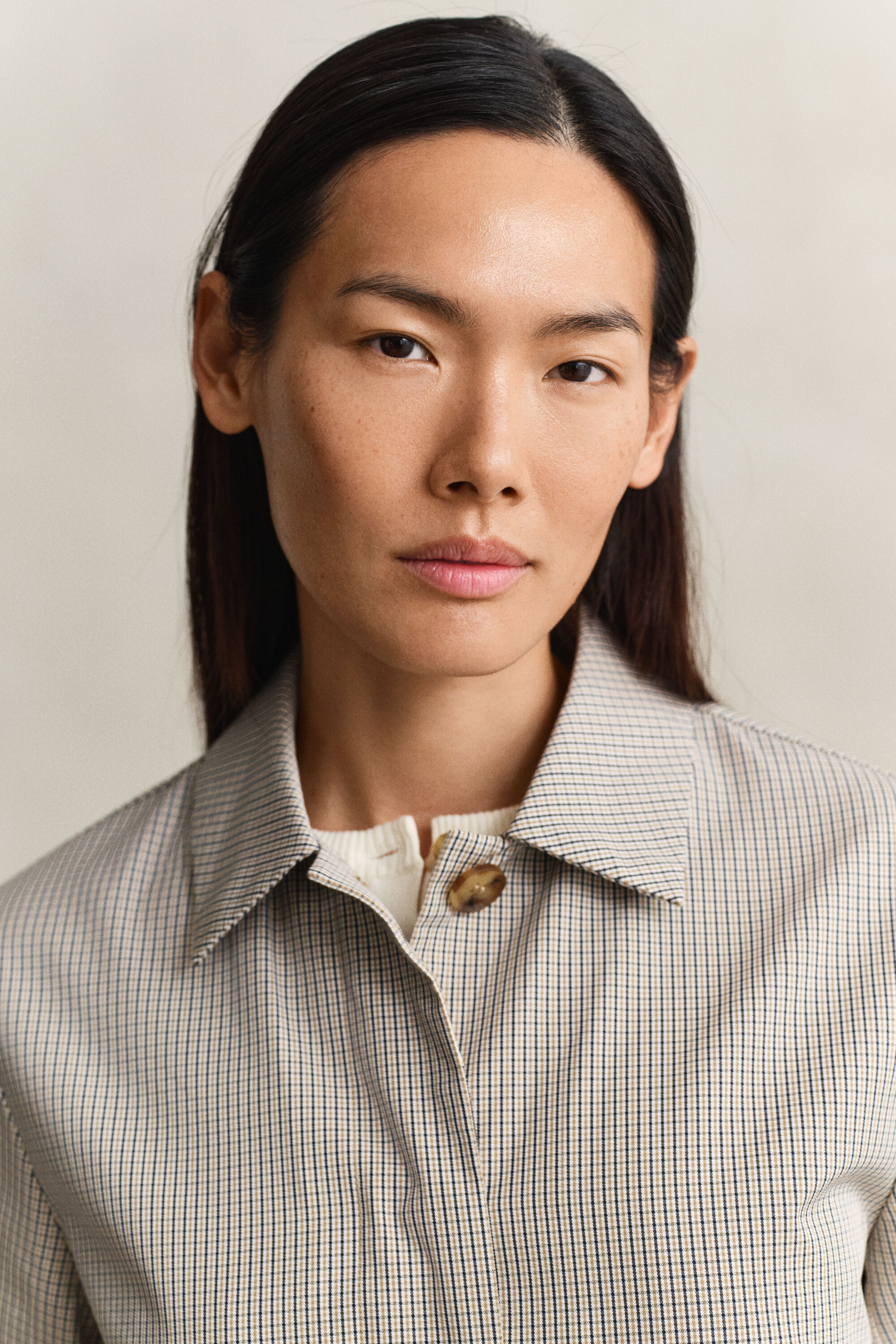 Gabardina com padrão de xadrez