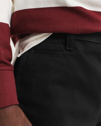 Calças chino em sarja e algodão relaxed fit