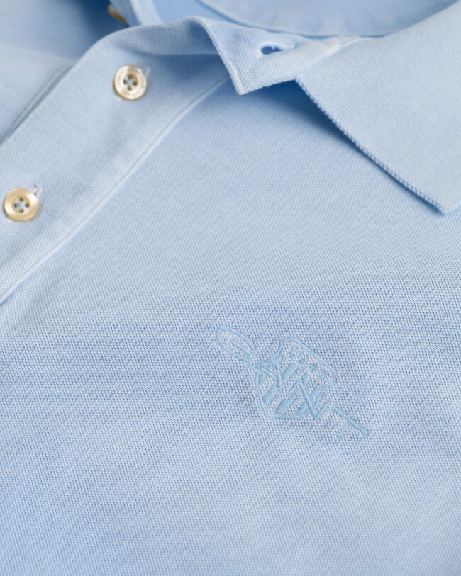 Polo em algod&atilde;o piqu&eacute; com tingimento com spray