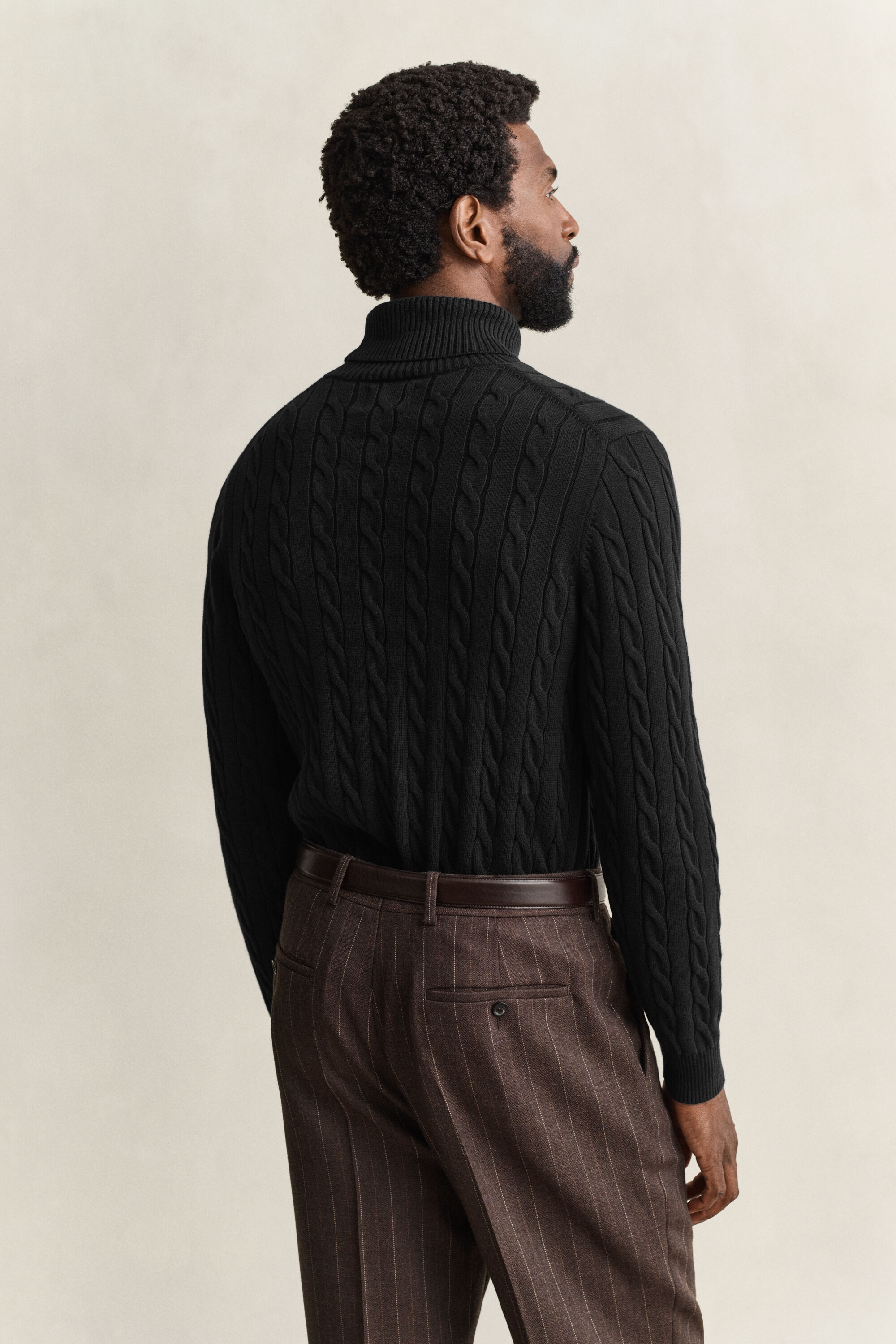 Camisola de gola alta em malha entrançada de algodão