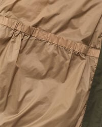 Blusão de penas de comprimento médio grosso