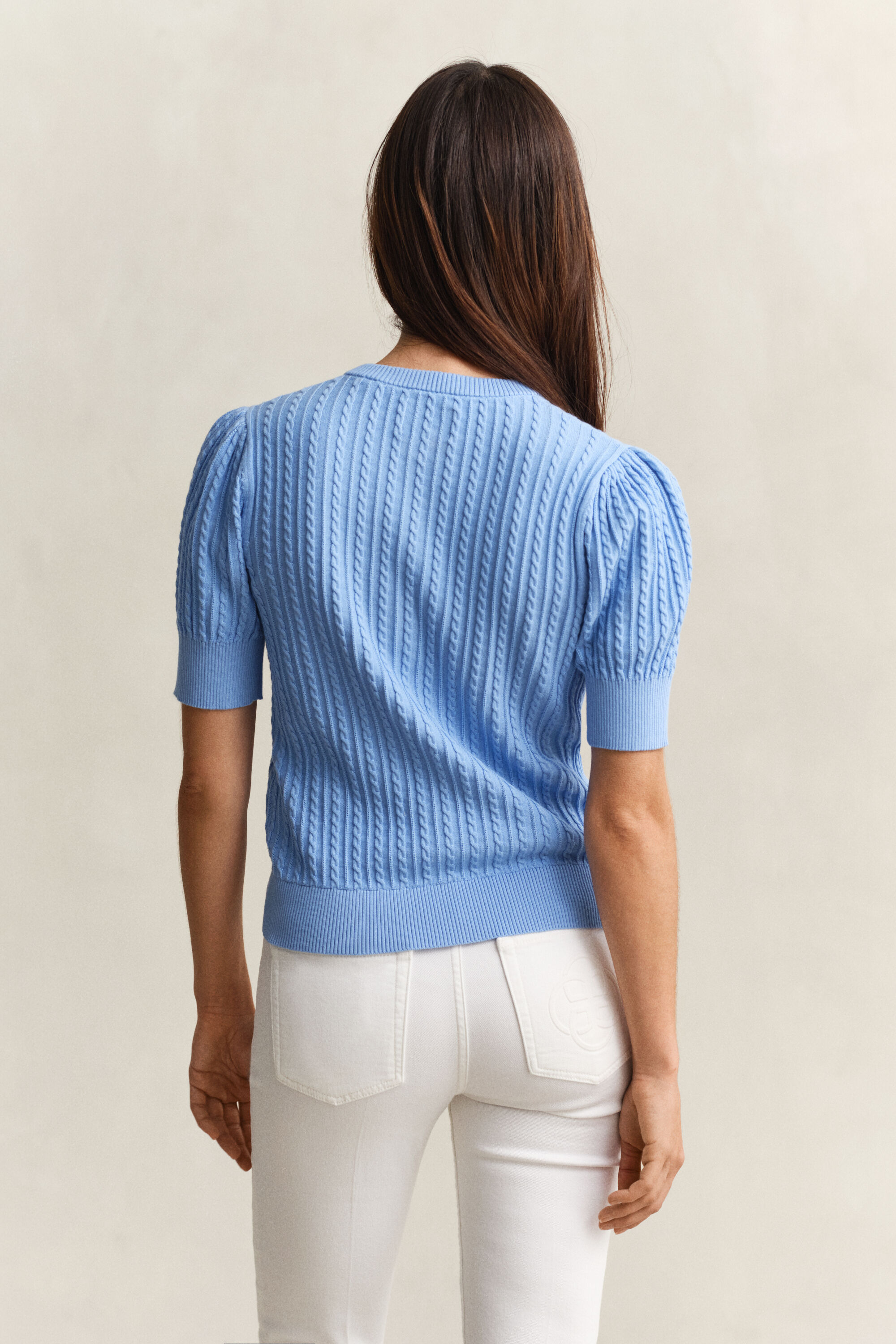 Casaco de malha entrançada em algodão