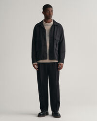 Calças chino em sarja com pregas