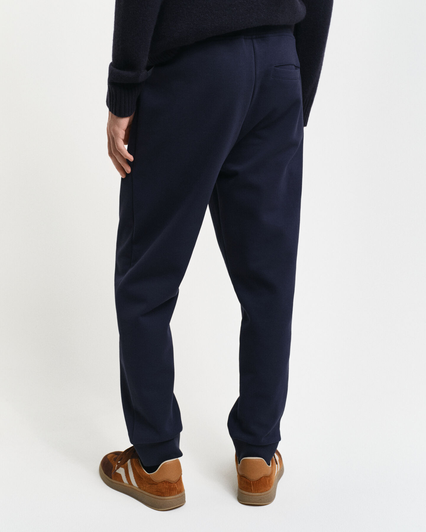 Calças desportivas com grafismo pequeno