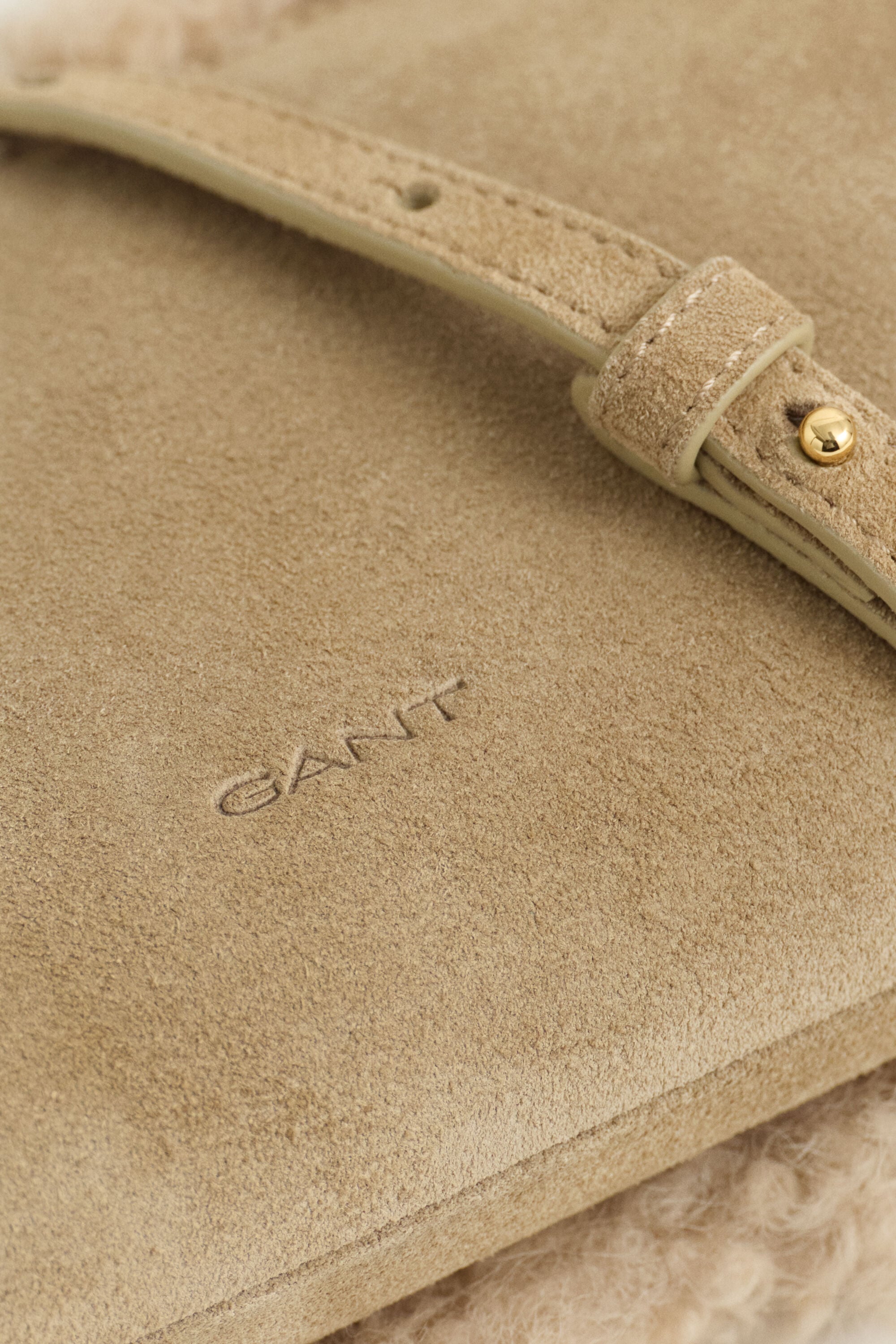 Clutch em lã de carneiro