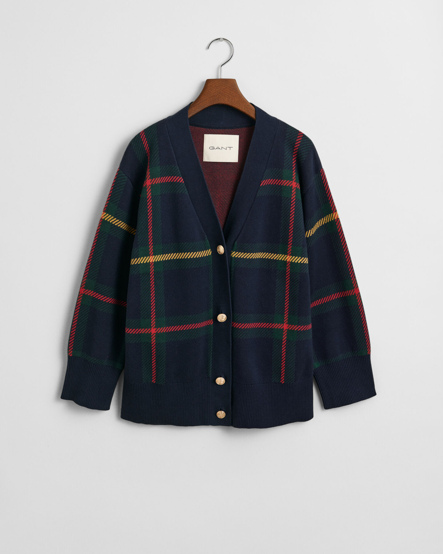 Casaco de malha com decote em V e padrão de xadrez