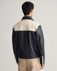 Blus&atilde;o em pele curto