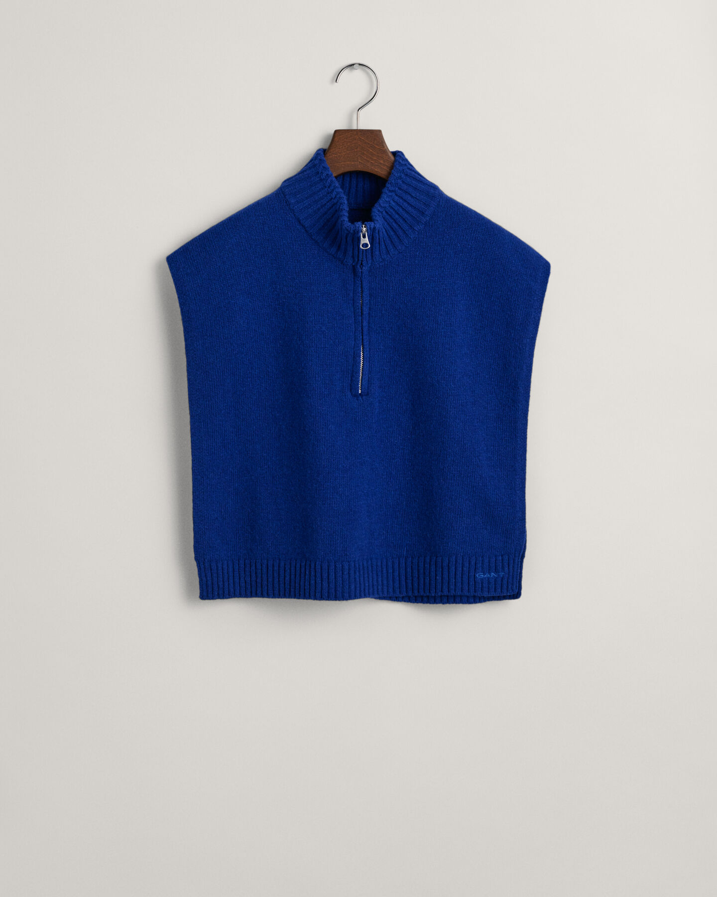 Peitilho em malha de lã com fecho de correr