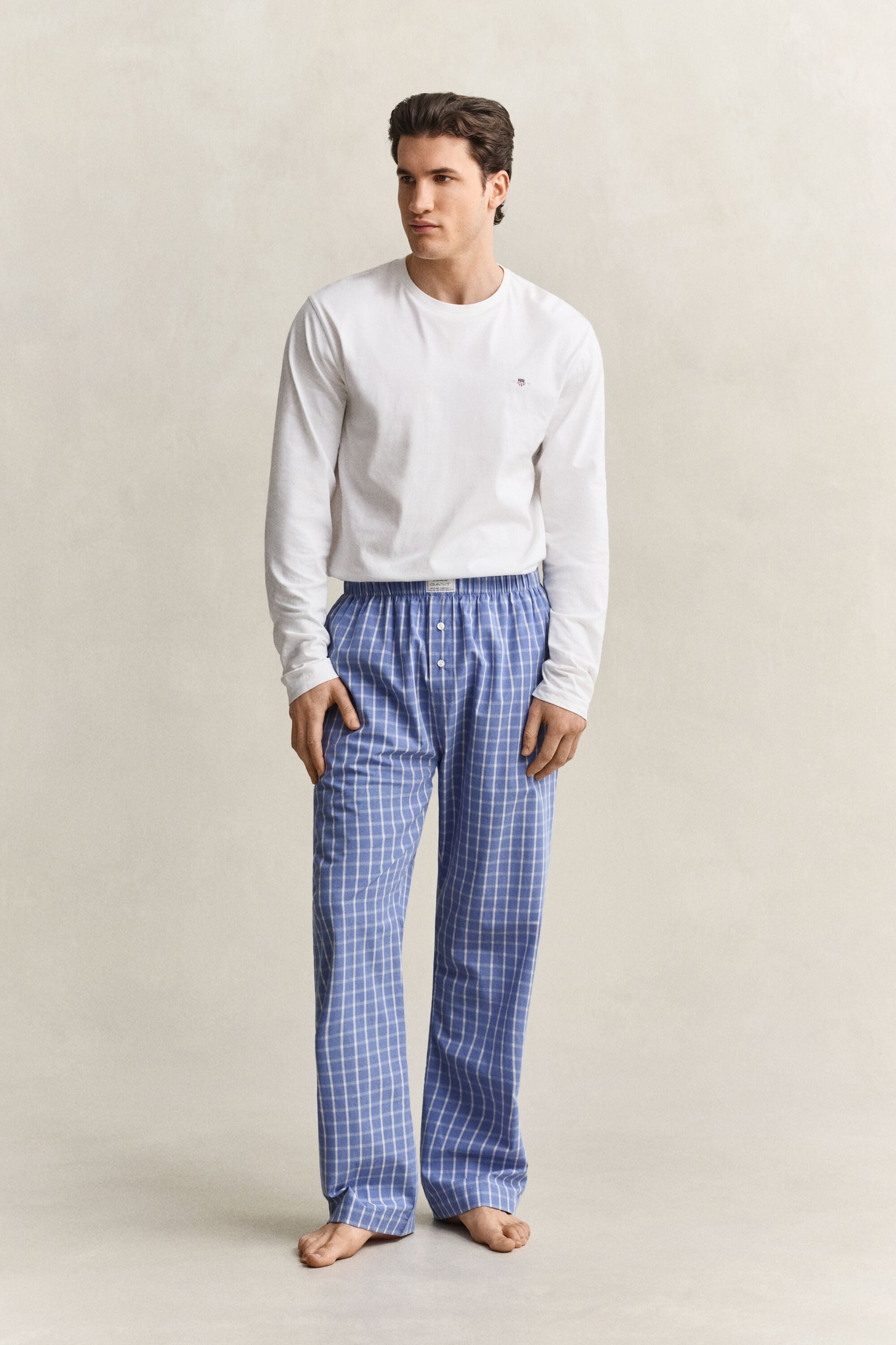 Calças de pijama com padrão de xadrez
