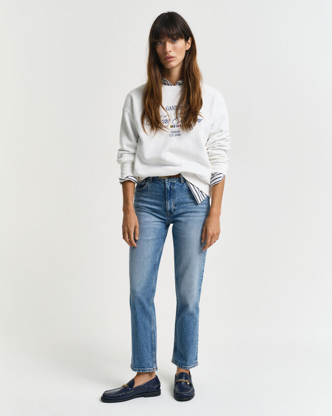 Calças de ganga pelo tornozelo com perna a direito