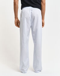 Calças de pijama às riscas