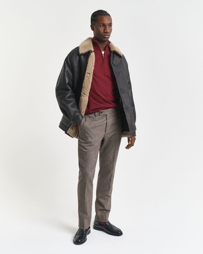 Camisola de malha com meio fecho de correr em lã de merino extrafina