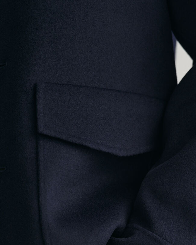 Casaco cosido à mão com 4 bolsos