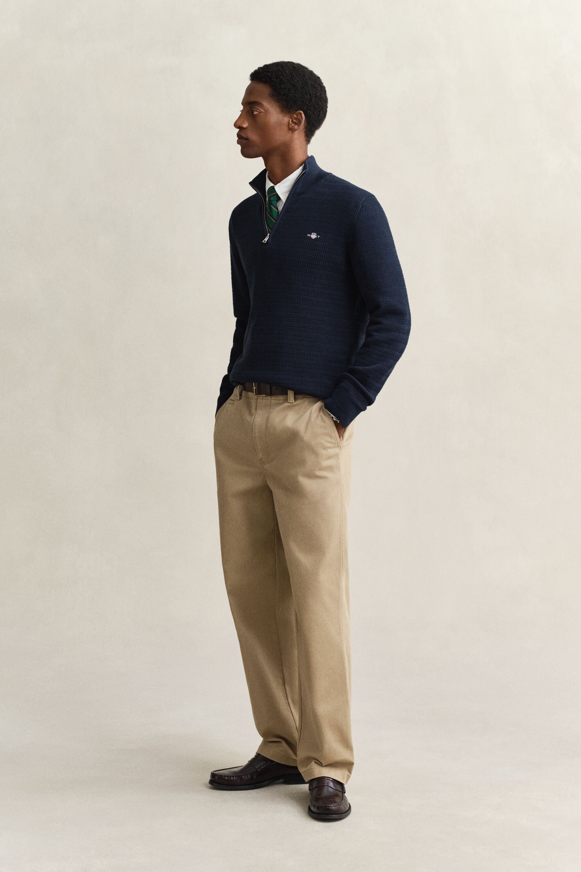 Camisola em mini malha entrançada com meio fecho de correr