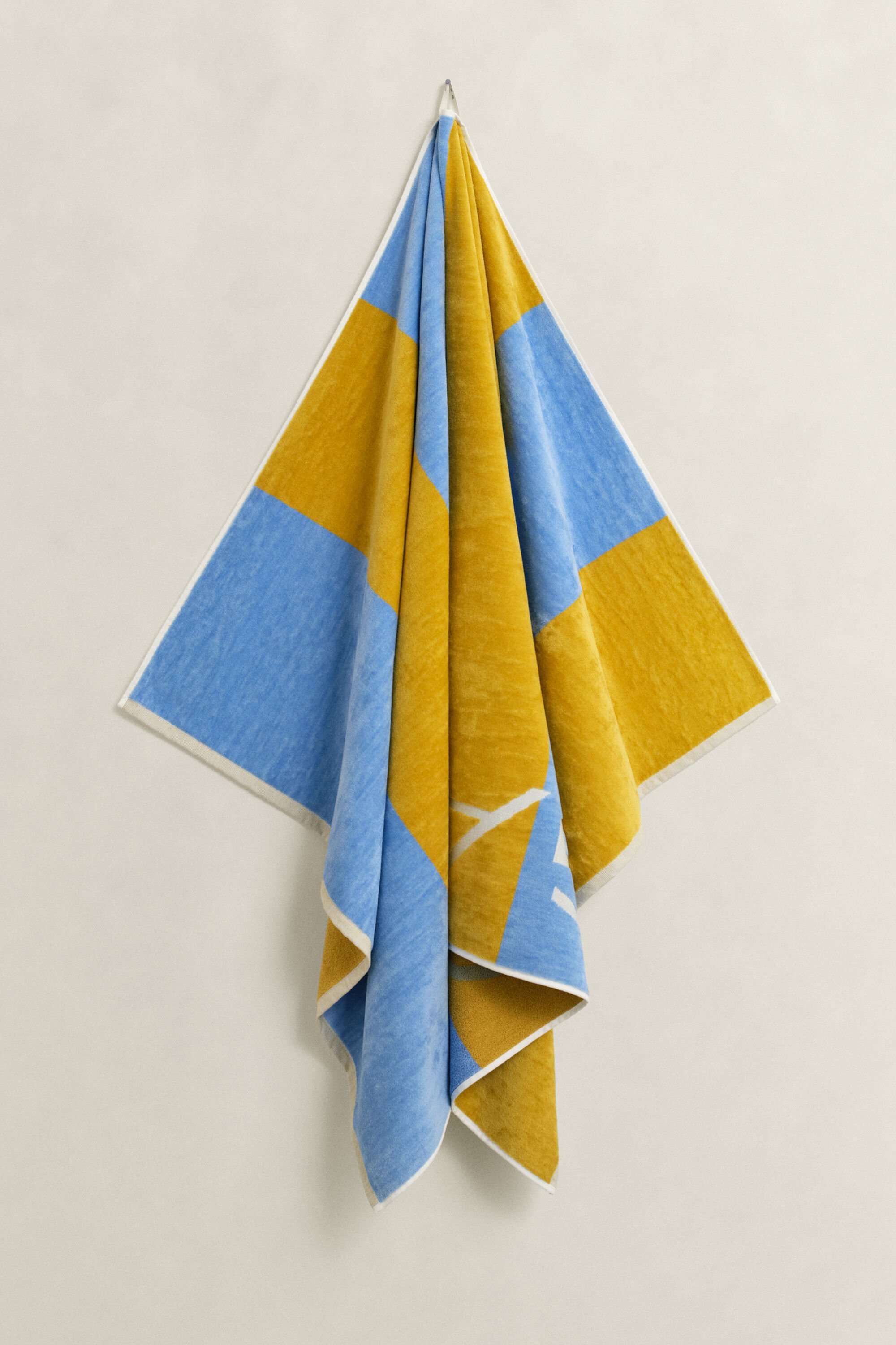 Toalha de praia às riscas em bloco