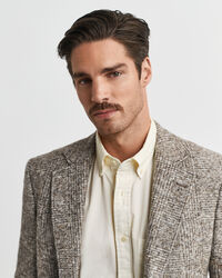 Blazer de malha com padrão de xadrez