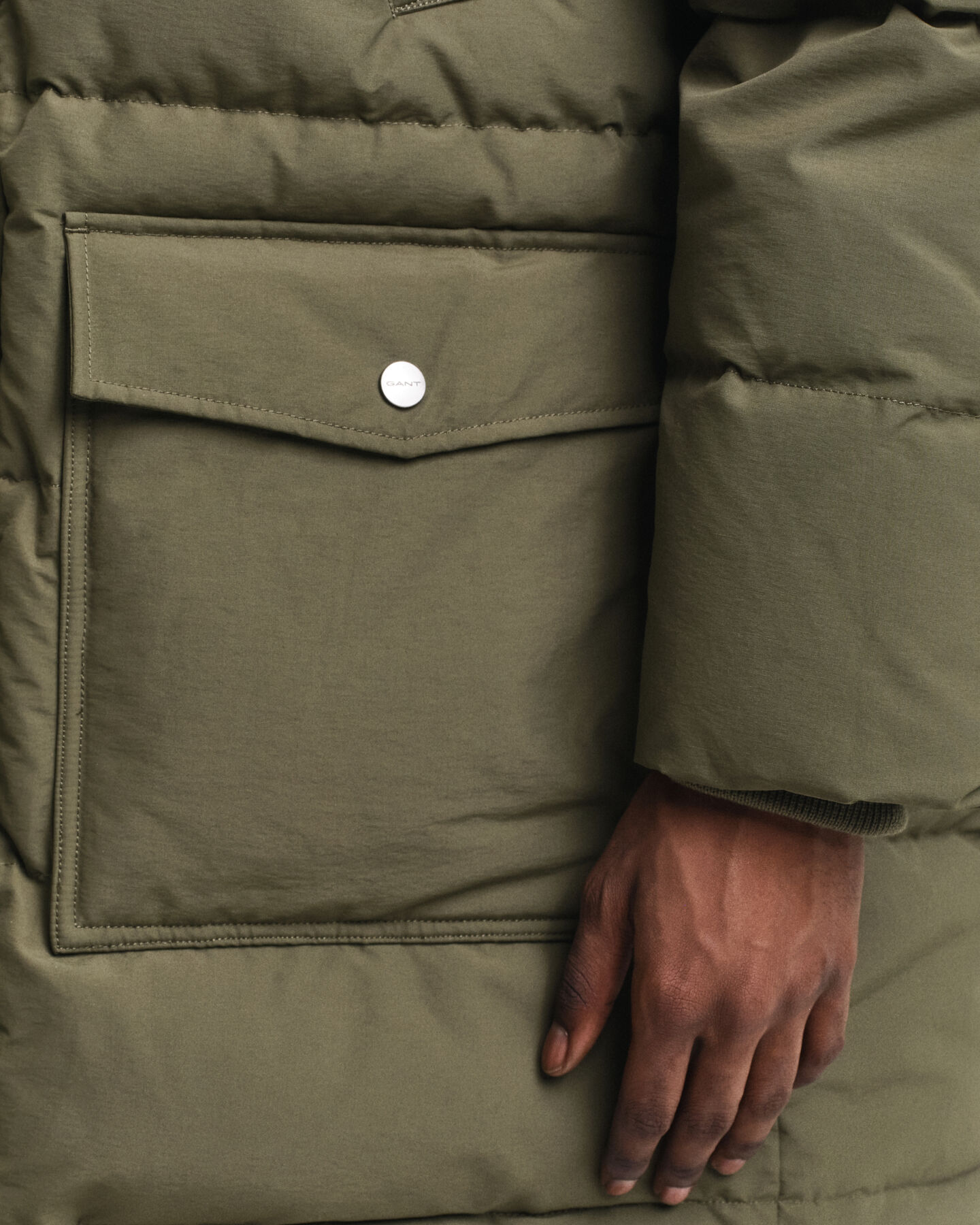 Blusão de penas de comprimento médio grosso