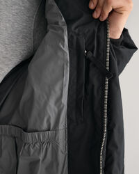 Blusão de penas comprido Alta