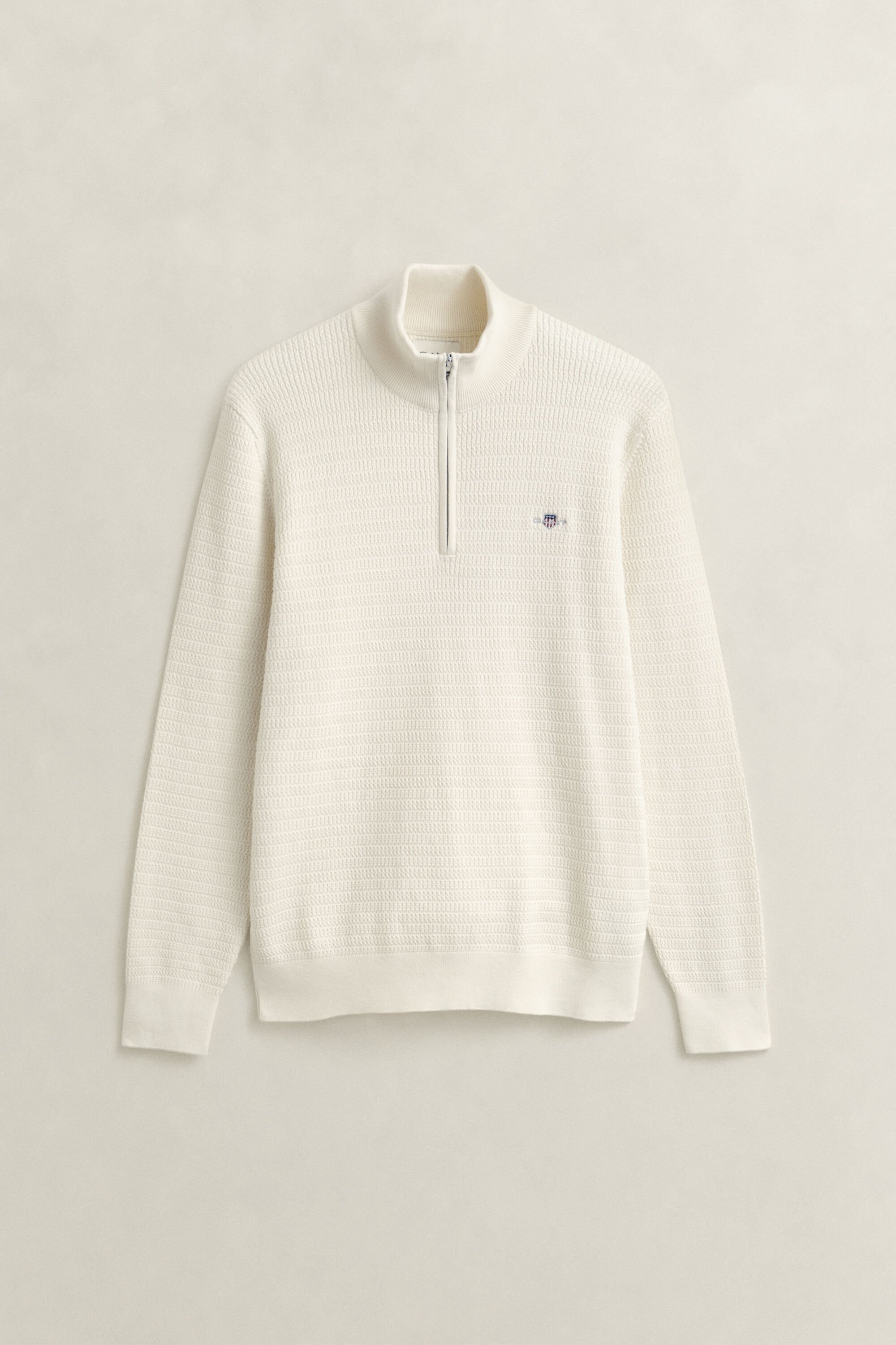 Camisola em mini malha entrançada com meio fecho de correr