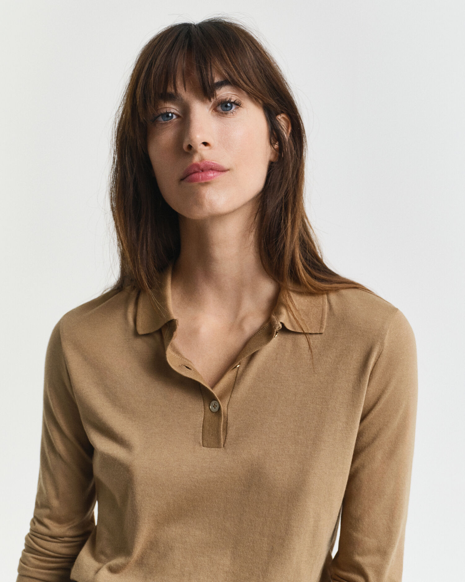 Polo de mangas compridas com botões