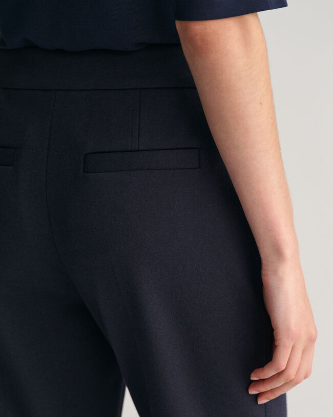 Calças cigarette em jersey