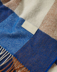 Manta decorativa com padrão de xadrez