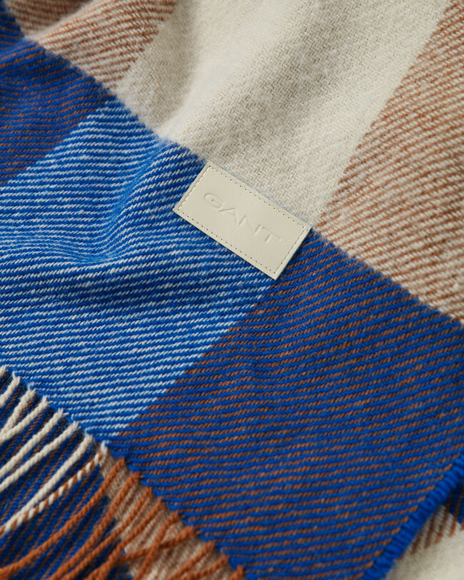 Manta decorativa com padrão de xadrez