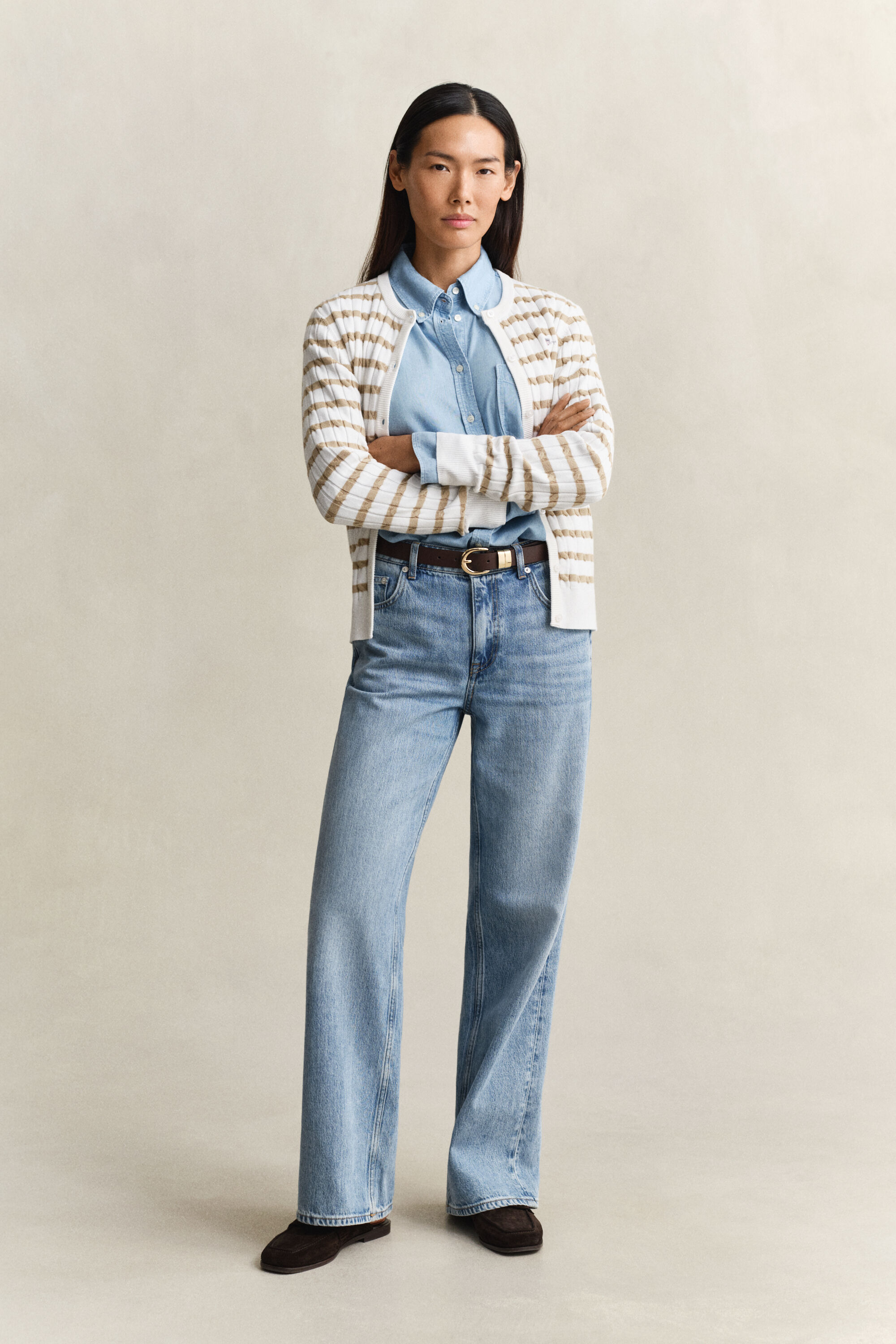 Casaco de malha entrançada às riscas