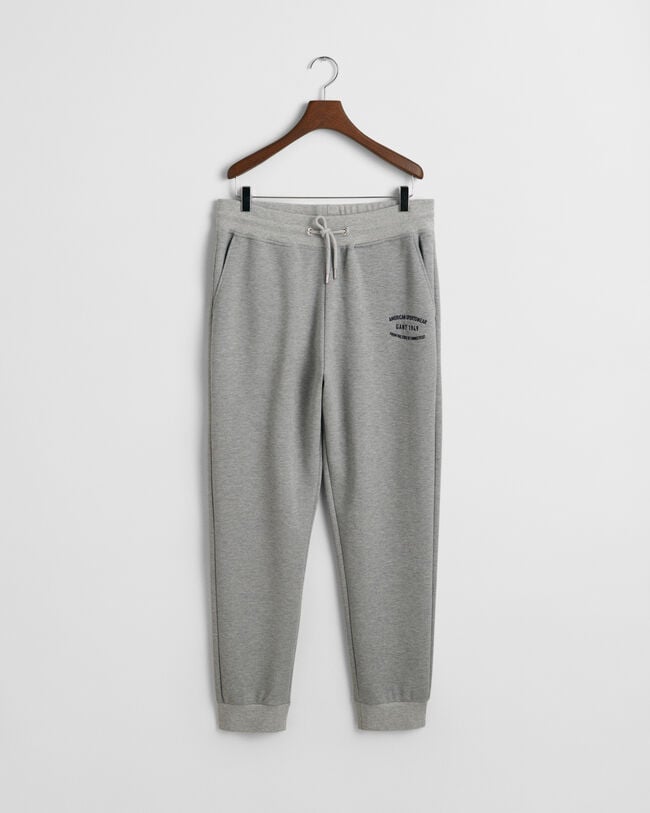 Calças desportivas com grafismo pequeno