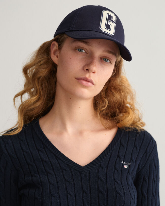 Pulover com decote em V entrelaçada em algodão com elastano