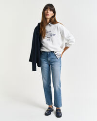 Calças de ganga pelo tornozelo com perna a direito