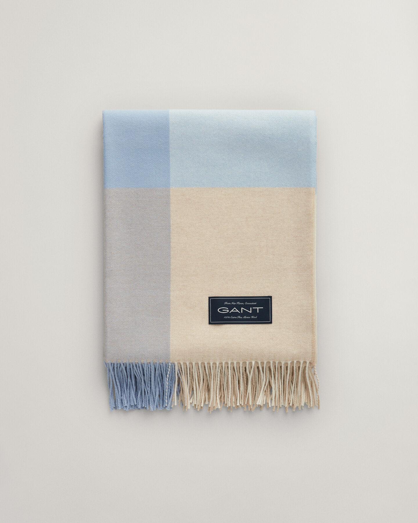 Manta decorativa com padrão de xadrez em lã de merino extrafina